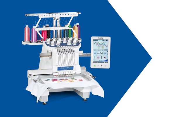 Brother PR1055X embroidery machine on blue background