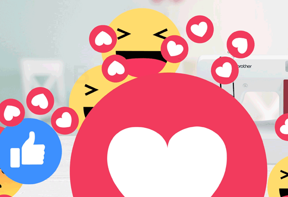 Grandi emoji felici che galleggiano davanti alla macchina da cucire