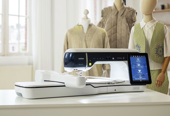 Brother EV1 on desk with sewing mannequin in background