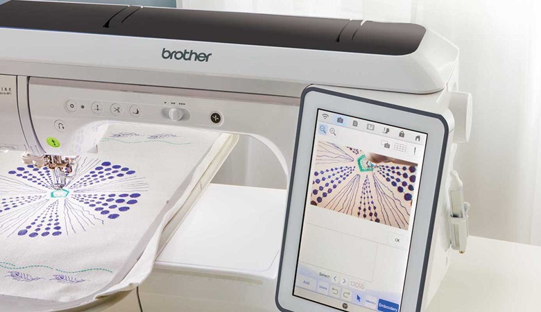 Circular embroidery on white fabric in embroidery frame of Brother XP3