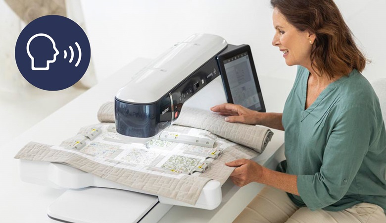 Woman sitting on Brother EV1 combination machine with voice icon in left corner