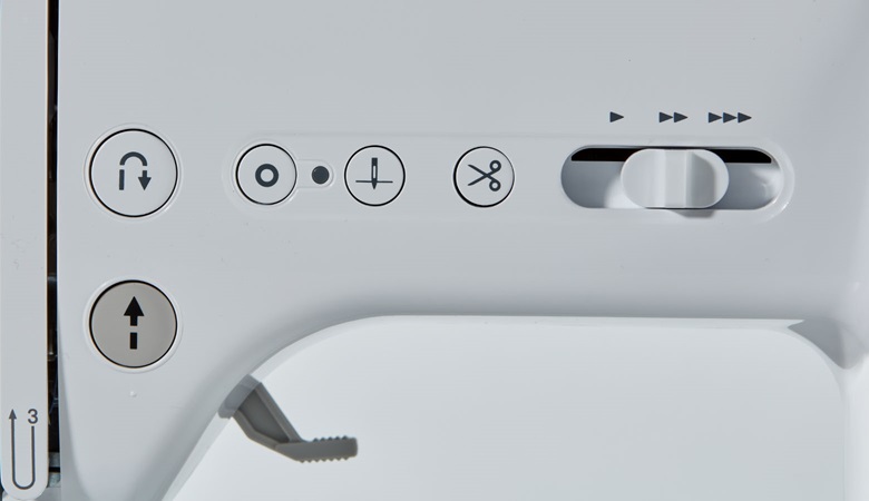 Close up of control buttons of Brother A-series sewing machine