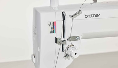 Close up of tension disc of Brother PQ1600S sewing machine