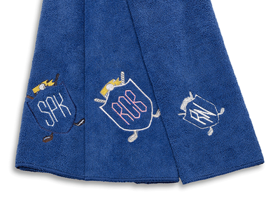 Three blue embroidered golf towels