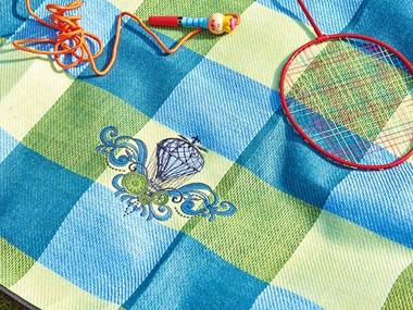 Blau-grünes Betttuch mit Luftballon-Stickmuster
