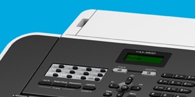 fax machine on blue background 