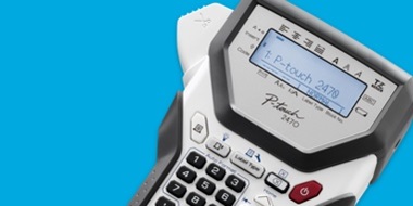 Labelling machine on blue background