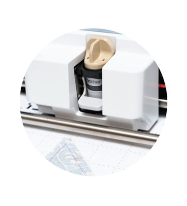 ScanNcut thin fabric auto blade with piece of cut fabric
