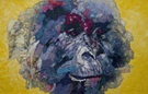 Pictorial quilt design of a gorilla’s face on yellow