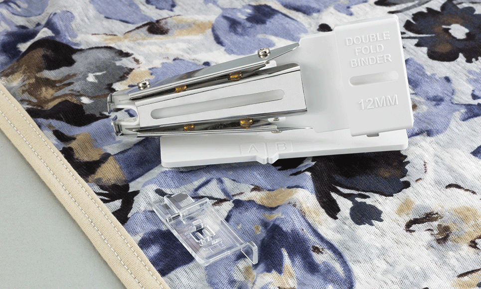 Double fold binder coverstitch on blue flower fabric with binded edge