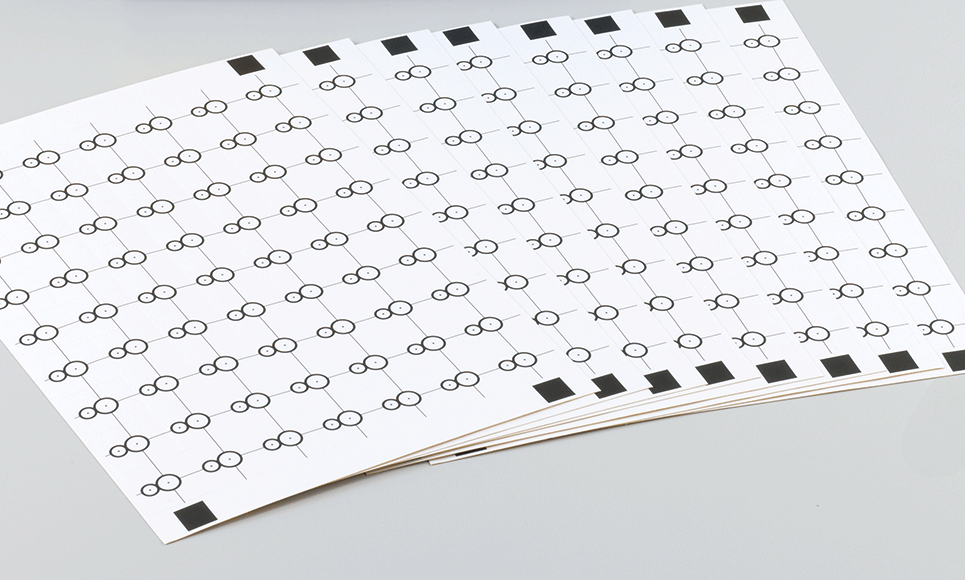 Sheets of white snowman shaped positioning stickers EPS2