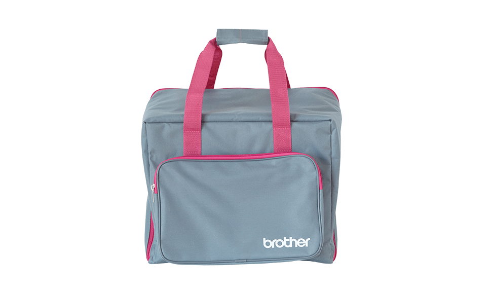 Grey overlock bag with pink handles and zippers