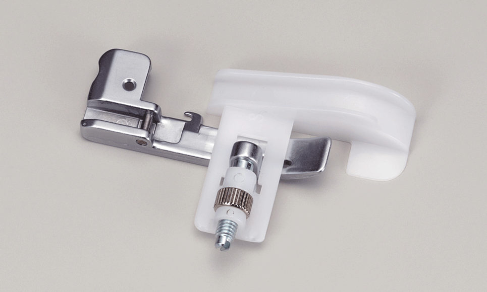 Brother Pearl presser foot SA217 on grey background