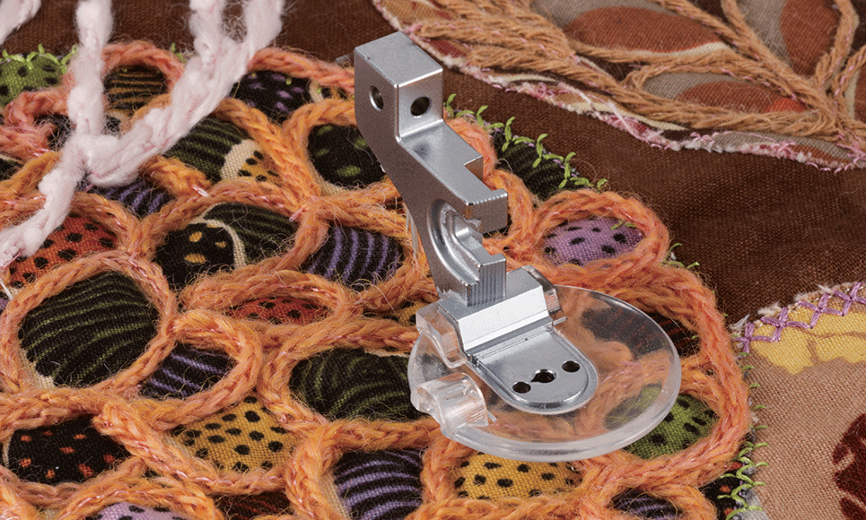 Round plastic and metal couching foot on flower fabric with couching