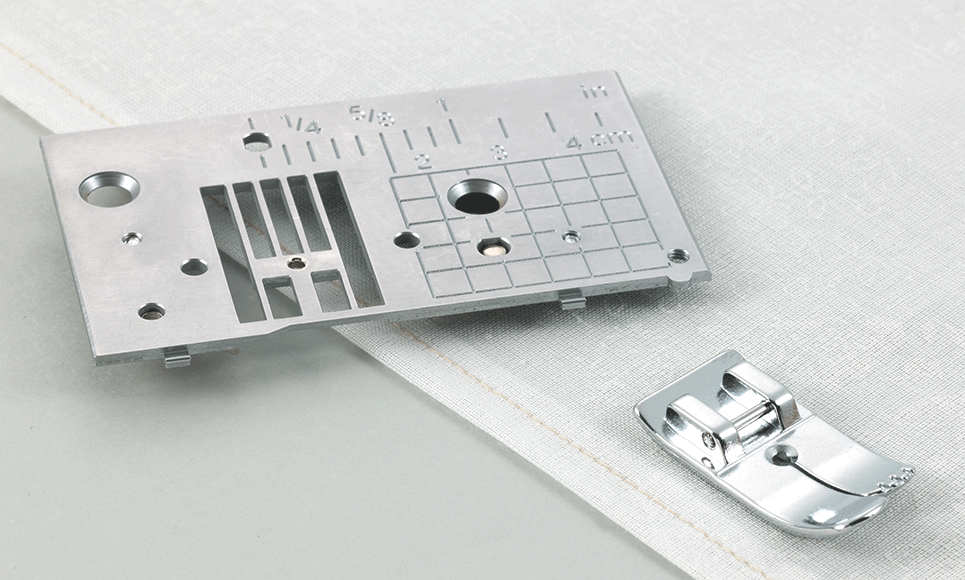 Straight stitch foot and matching needle plate SNP02 on white fabric